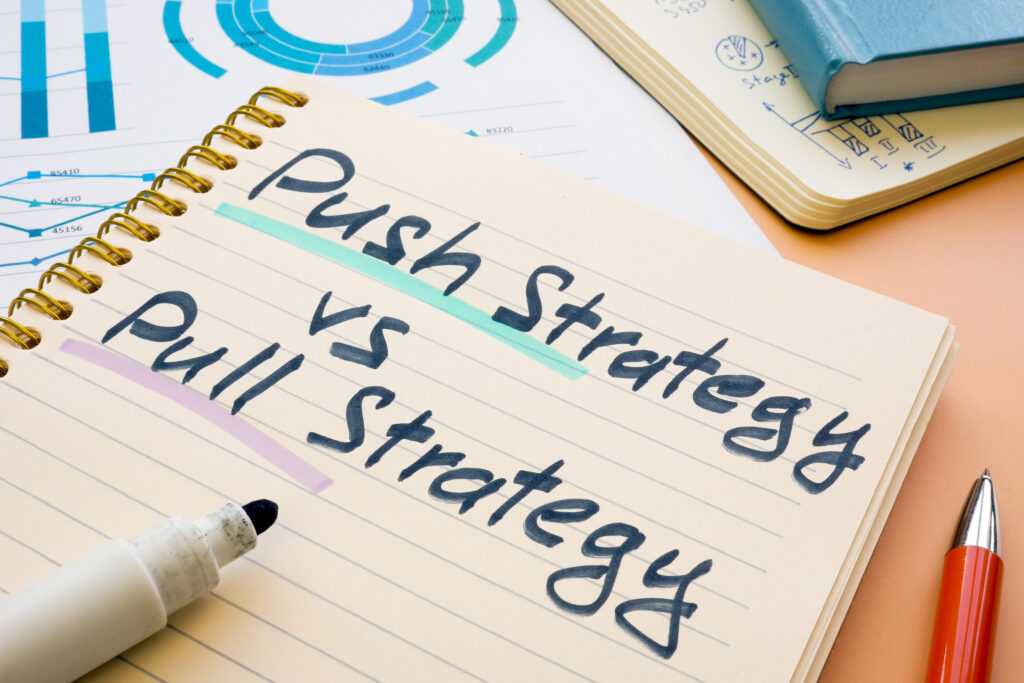 a notepad with words about push & pull marketing strategy