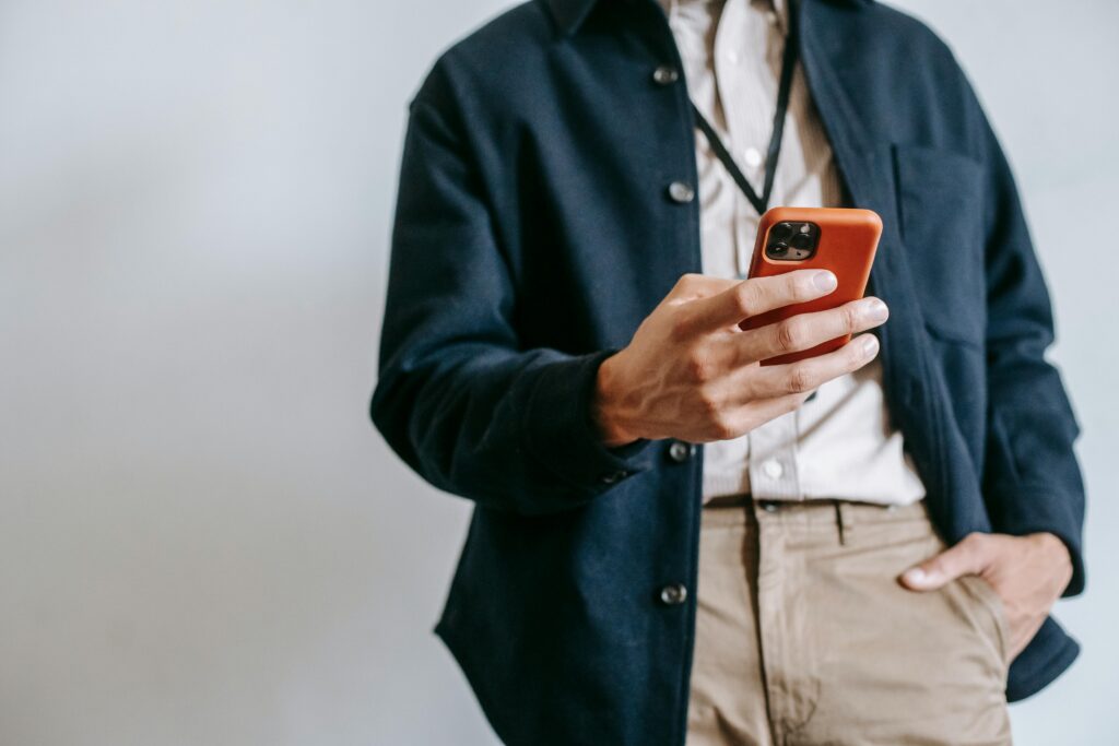 Man reading SMS campaign. CDP & CRM CareCloud lets you create personalized SMS campaigns.